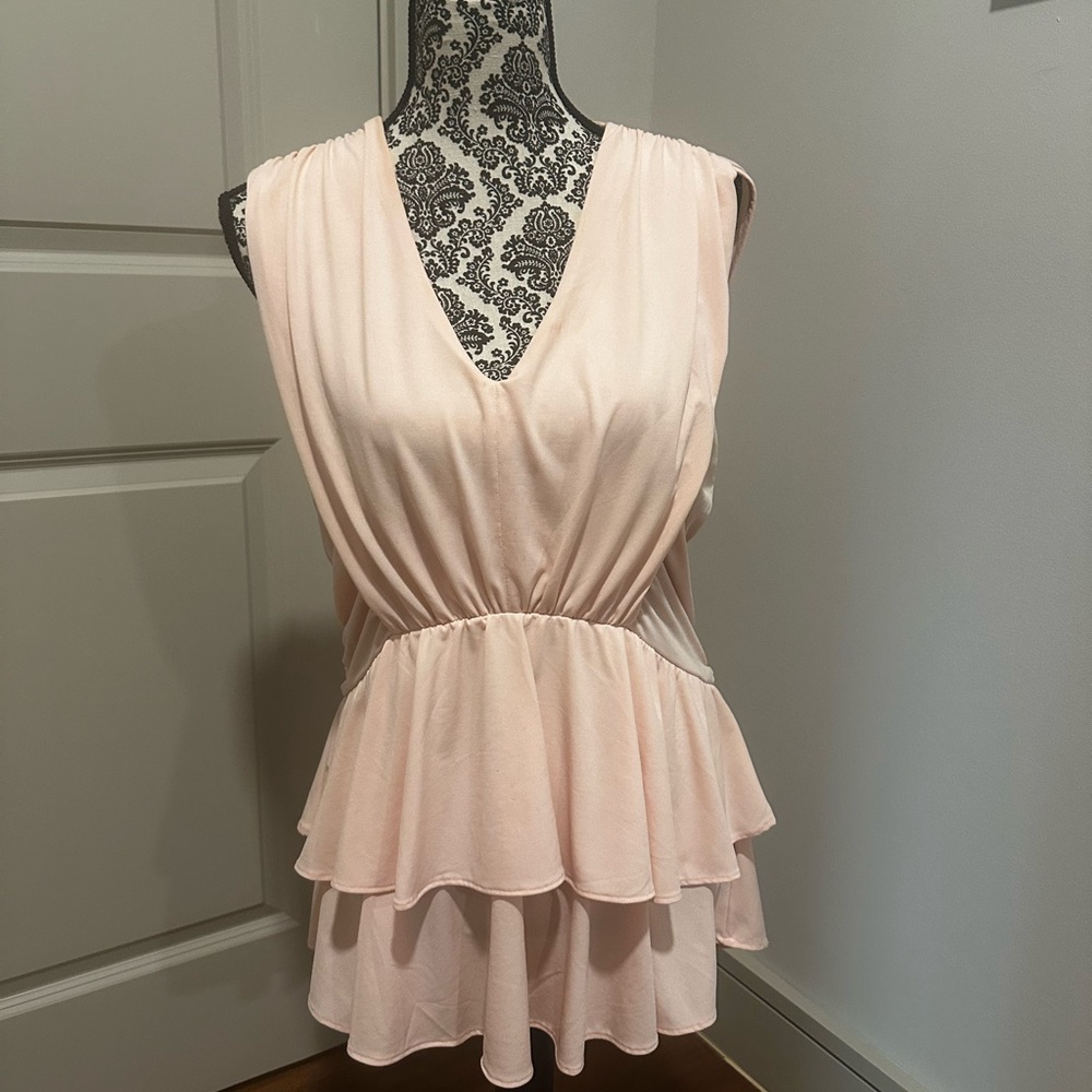 Elegant Pink Sleeveless Peplum Top